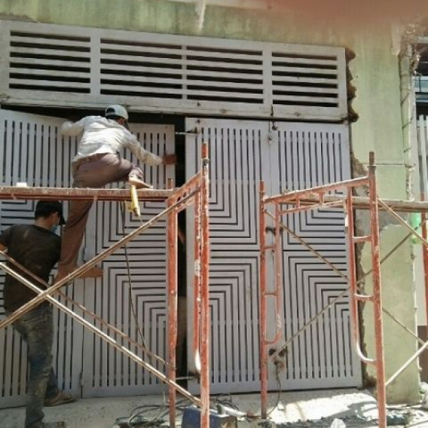 Sửa cửa sắt giá rẻ